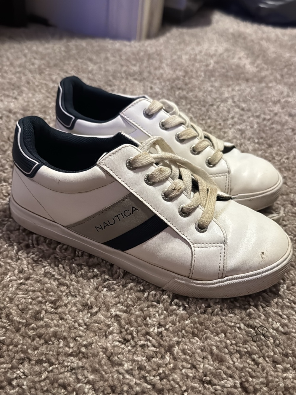Nautica White Sneakers and black and white Sneakers. (2 PAIRS OF SHOES)